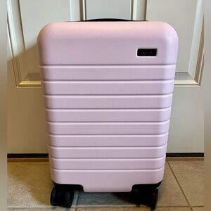 Away kids carry on suitcase in pink
